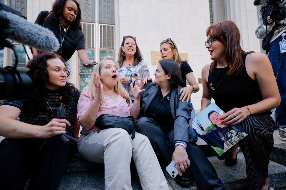 Amy Neville, mother of Alexander, Mary Rodee, mother of Riley Basford, lawyer Laura Marquez-Garrett, and CEO of Heat Initiative Sarah Gardneroutside the court after the jury found Meta and Google liable in a test case accusing Meta and Google's YouTube of harming children's mental health through addictive social media platforms, in Los Angeles, California on Wednesday.  Photo: Getty